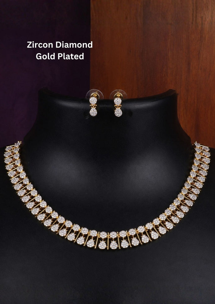 Pure zirconian diamond 18K gold plated necklace set featuring sparkling teardrop stones with matching earrings set crafted with brilliant teardrop stone detailing. Perfect for weddings, parties and festive occasions.