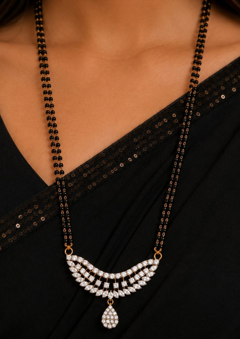 South indian womens Premium zircon diamond double chain mangalsutra with a graceful curved pendant and teardrop drop, designed for weddings, festive occasions, office wear, and daily elegance.