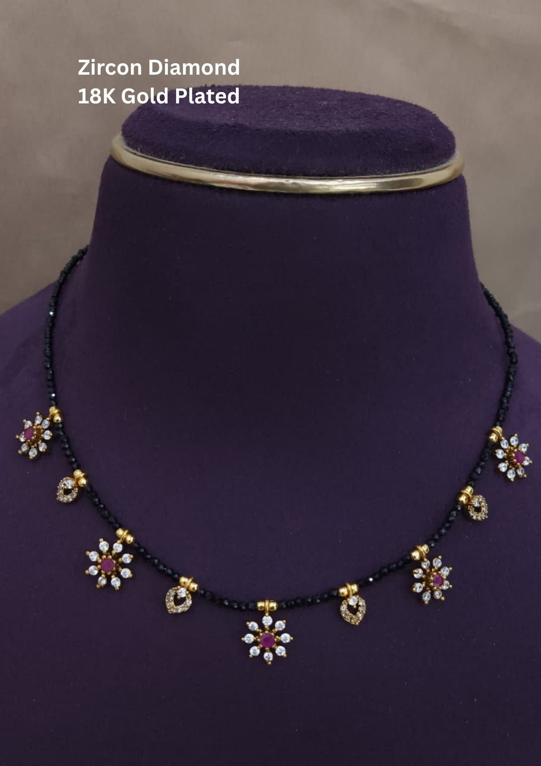 gold plated flower mangalsutra (nallapusallu) come with zircon diamond and its a traditional to all the women and can use for dailyware , festival ware , functional 