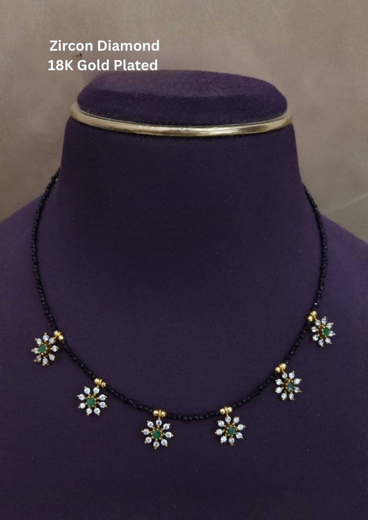 Necklace with floral designs