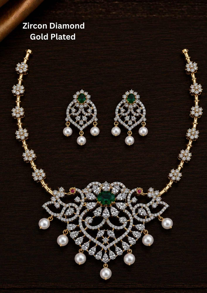 Gold-plated zircon diamond necklace and earrings comes with peacock design and shows in detailed how it look and looks and comes with green gemstone and very classy and neat finishing and can be use for festival , weeding and can gift 