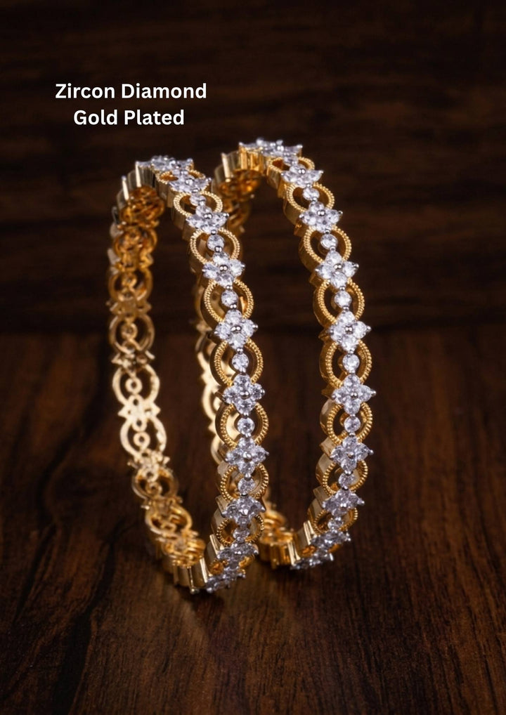 Gold-plated zircon diamond bangles comes with set of 2 and looks vert clear in picture how it looks and also in ide the bangle also in detailed and can be used for office ware , festivals and functions 