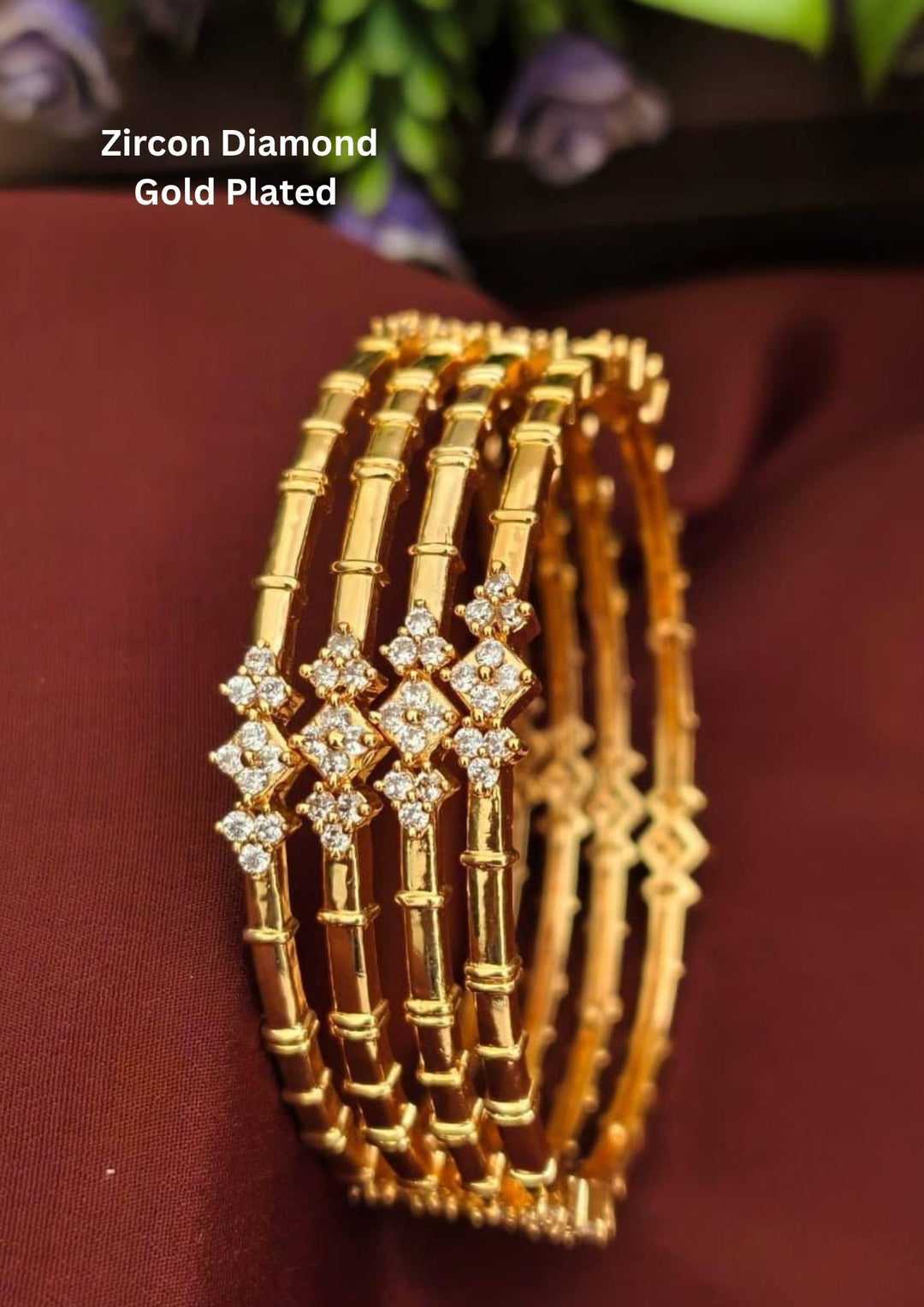 Gold-plated bangles with zirconia diamond stones and in picture comes with set of 4 and looks vert clear in picture how it looks and also in the bangles looks in detailed and can be used for office ware , festivals and functions 