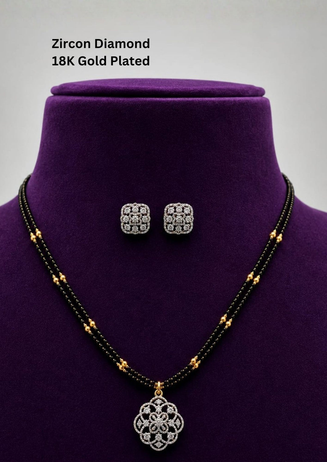 Beautiful 18K gold plated zircon diamond mangalsutra set featuring a floral crystal pendant, double black bead chain, and matching square stud earrings. Perfect for daily wear, office wear, festive occasions, weddings, anniversaries, and gifting.