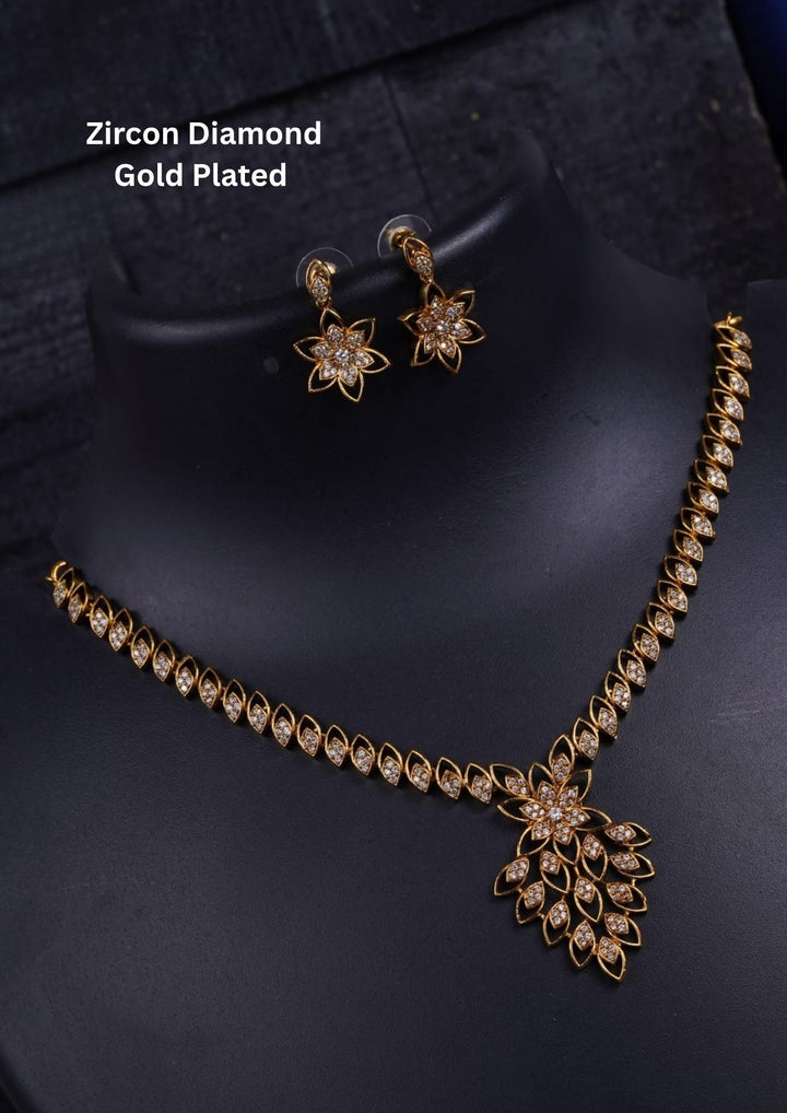 Gold-plated necklace and earrings Zircon diamond gold-plated necklace and earrings with classic model and shown very detailed in picture how it looks and do use for weeding's , festivals and can gift and kitty party's 