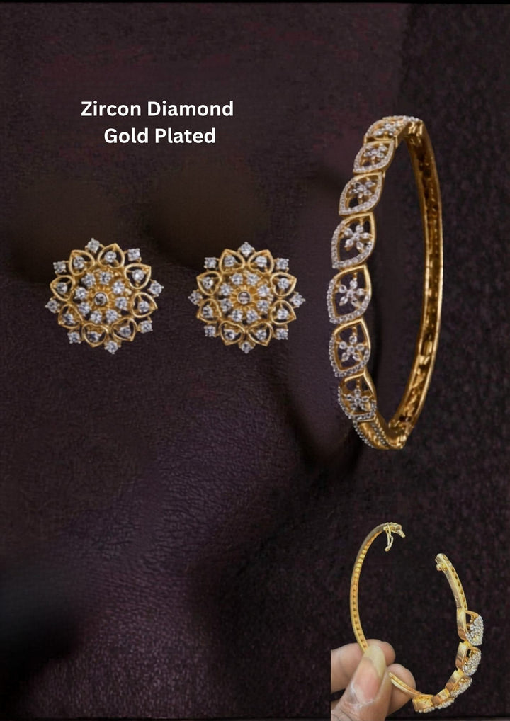 Diamond Gold Plated bracelet and  studs with heart shape design, intricate, delicate for dailywear and festive wear and used by south indian women. 