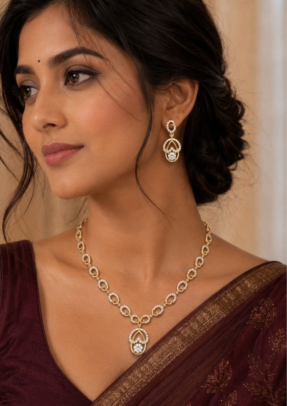 South indian women wearing a Stylish Zircon Diamond gold plated necklace set featuring an elegant oval link design with matching dangling earrings. Perfect for parties, weddings, festive occasions, and gifting.