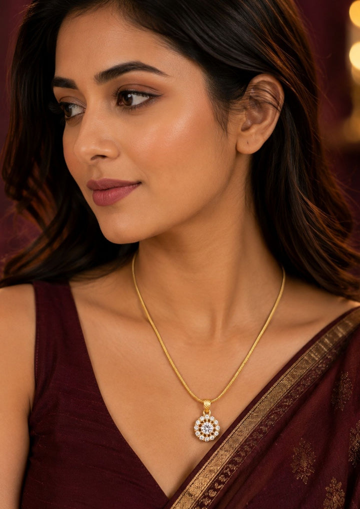 South indian women wearing a Beautiful Zircon Diamond gold plated pendant chain featuring a brilliant round solitaire-inspired pendant with sparkling zircon stones. Perfect for daily wear and festive styling.