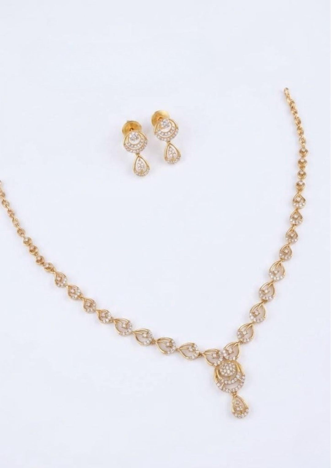 Zircon Diamond necklace set in traditional and white background with  flat detailed with pooja , functional  and for gifting  