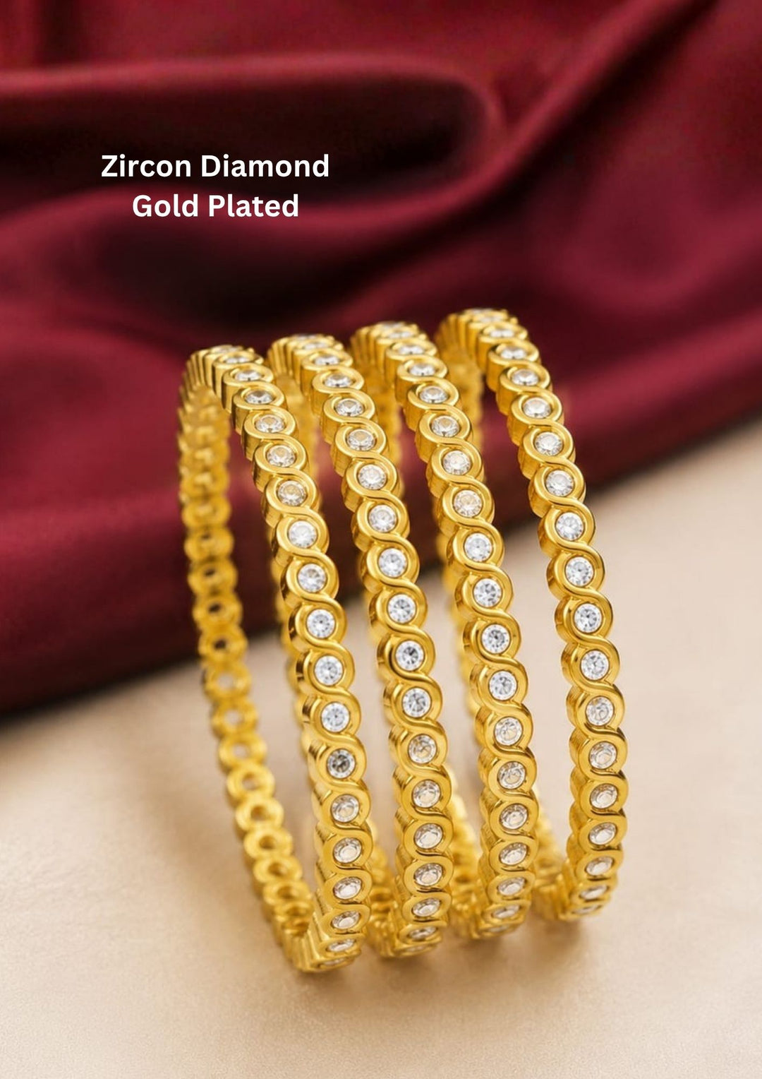 Elegant zircon diamond gold plated bangles featuring a sleek continuous row of sparkling zircon stones set in a premium gold finish. Perfect for weddings, parties, and festive occasions.