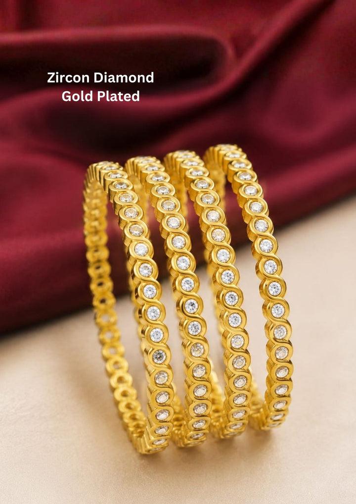 Elegant zircon diamond gold plated bangles featuring a sleek continuous row of sparkling zircon stones set in a premium gold finish. Perfect for weddings, parties, and festive occasions.