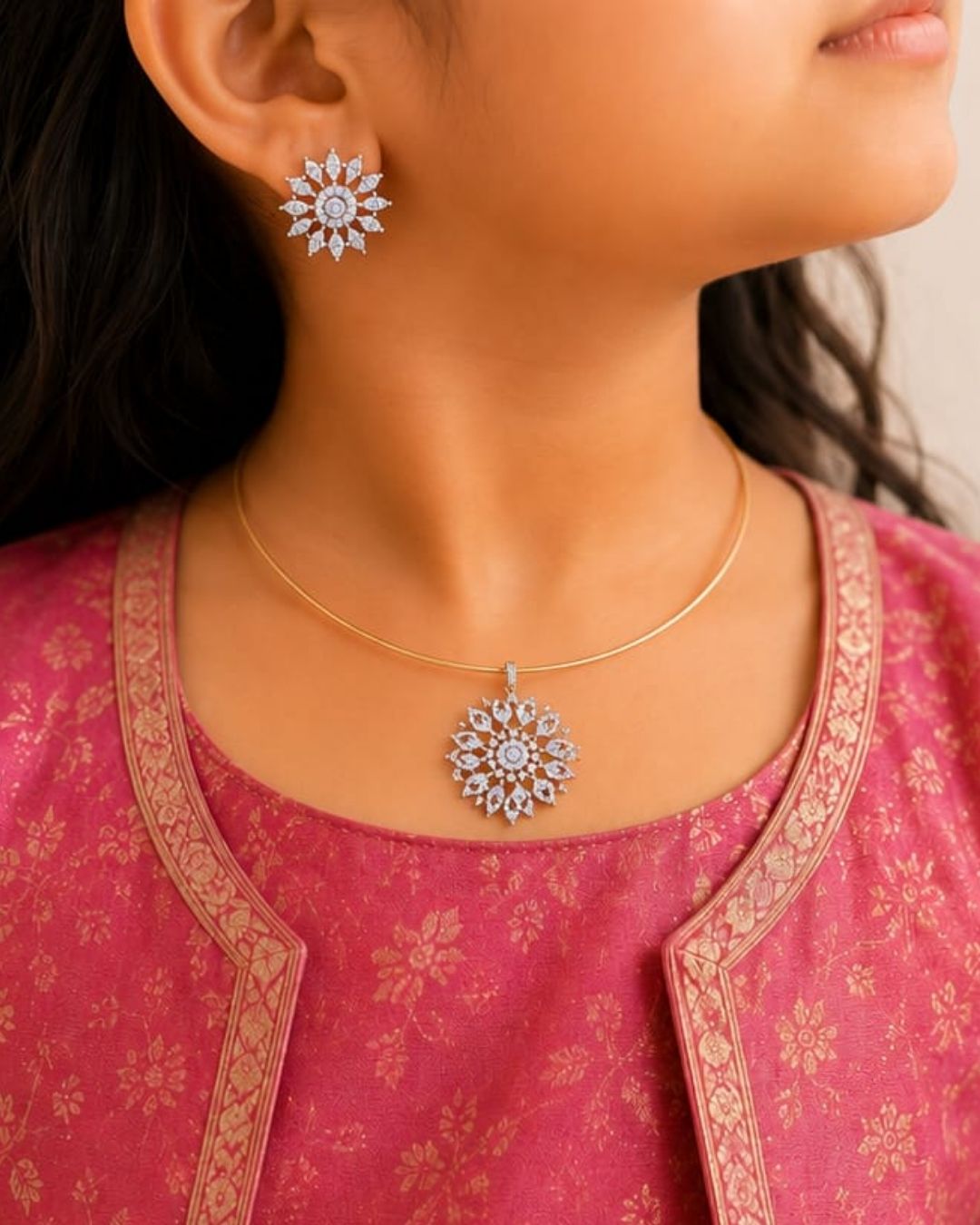 Premium gold plated necklace set featuring a large floral-inspired zircon pendant surrounded by sparkling stones, paired with matching floral stud earrings. Perfect for weddings, festive occasions, parties, traditional wear, and gifting.