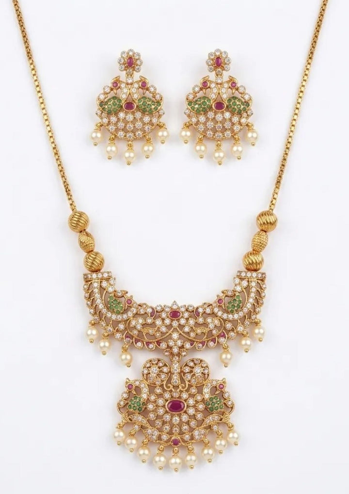 The necklace chain features an intricate, openwork link pattern. It is made up of a repeating series of tiny, curved gold wire loops and leaf shapes. Every single link is densely encrusted with micro-pave white zircon stones that mimic the shimmering look of a real diamond strand.
