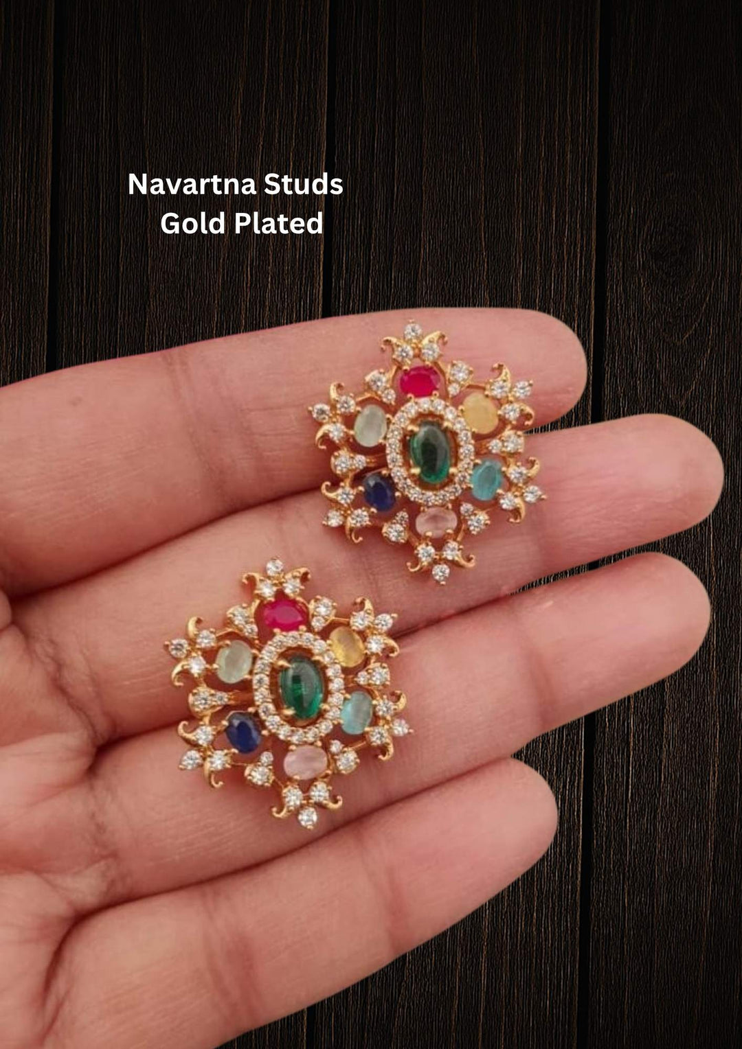 Gold-plated zircon diamond studs with Navaratna  looks very classy and  elegant can be used for daily ware , festive ware and perfect for gift 
