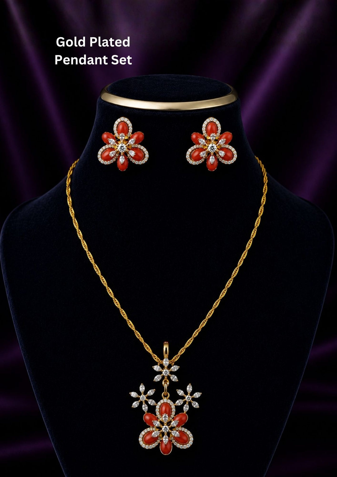 Open Hook Pendant Gold Plated jewelry set with one floral locket pendant and matching pair of earrings designed with red coral style stones and sparkling white zircon diamond detailing. The locket features flower petal pattern with hanging floral branch design and the earrings come with matching flower design finished in shiny gold plating. This lightweight jewelry set comes with sweat proof quality, anti-fade colour, skin-friendly finish, smooth fitting, and is suitable for daily wear, functions, parties, 