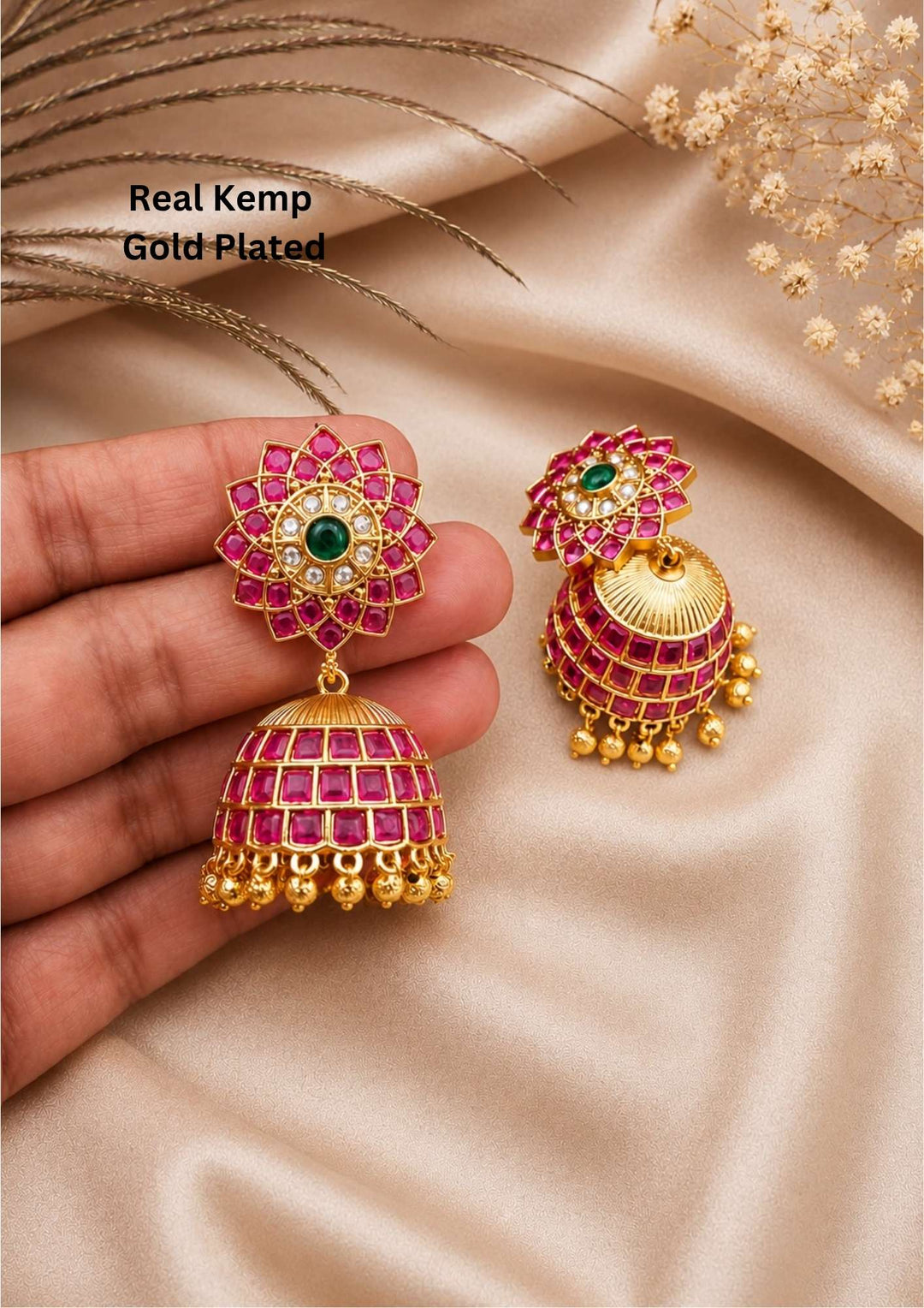 Gold-plated earrings with pink stones and green emerald with doom shaped butas and bottom is with gold bead hangings perfect for weddings, parties, festivals