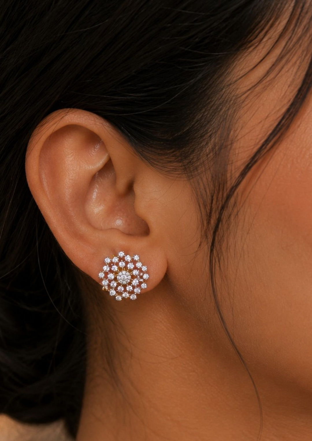 Close-up of an ear wearing a Zircon Diamond Gold Plated star Model Ear Studs it is very simple studs and looking very classy and can use for office wear and daily ware skin safe and anti fade 