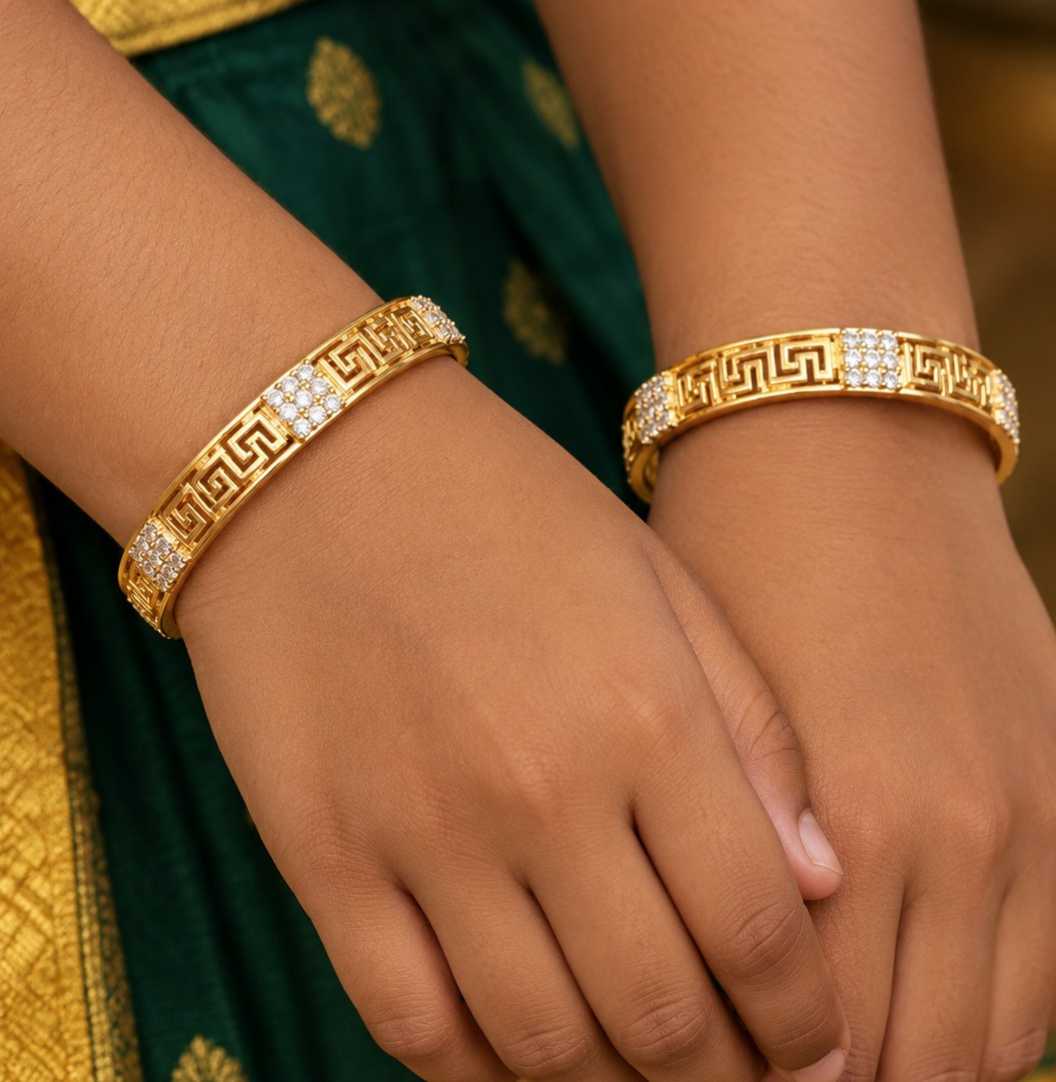 gold plated classic bangles come with zircon diamond and in picture shows clearly how it looks looks very classy and simple and ani faded and skin safe and can be used for daily ware, office ware and festivals
