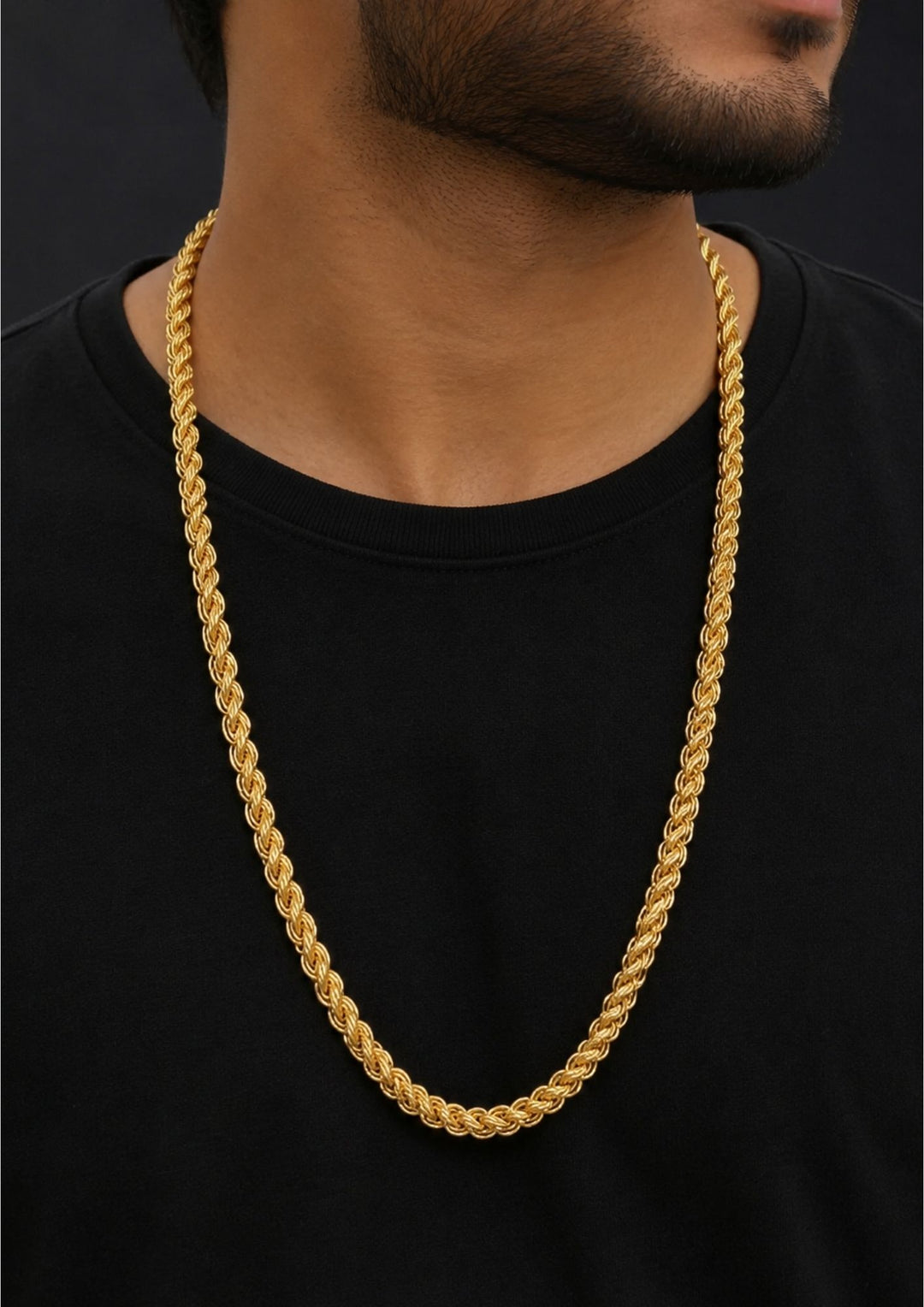 A close-up of a man wearing a thick, shiny gold rope chain necklace perfect for daily wear and come with anti tarnish color