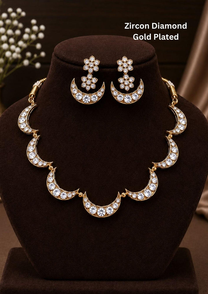 Gold-plated zircon diamond necklace and earrings set designed with half moon shape pendant and matching earrings perfect for parties and its anti fade color