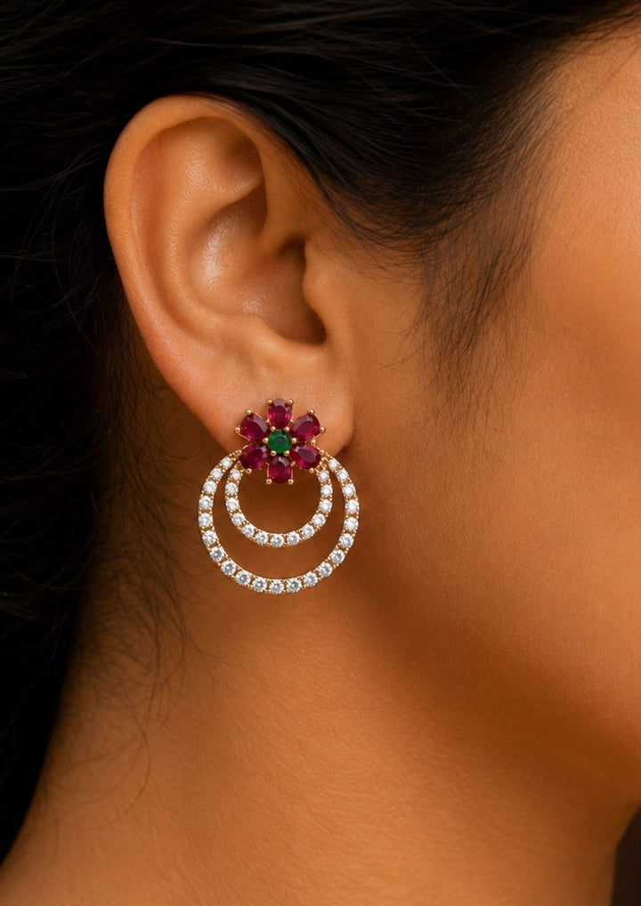 Nine pairs of gold-plated zircon diamond stud earrings in various designs, including floral, double hoop, and cluster styles,Elegant zircon diamond gold plated stud earrings combo featuring colorful floral studs and sparkling circular hoop earrings. Perfect for daily wear, office wear, festive occasions, gifting, and special events.