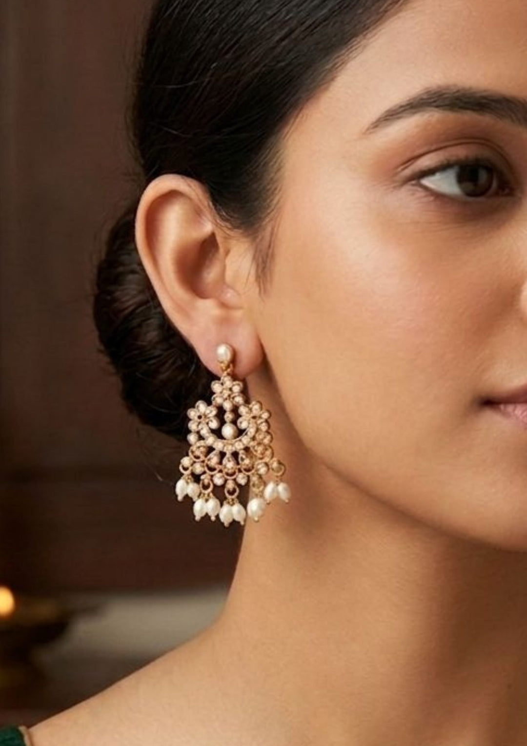 South indian woman wearing delicate gold plated pearl beads with earings , traditional look for pooja and funtionsal in pattu saree