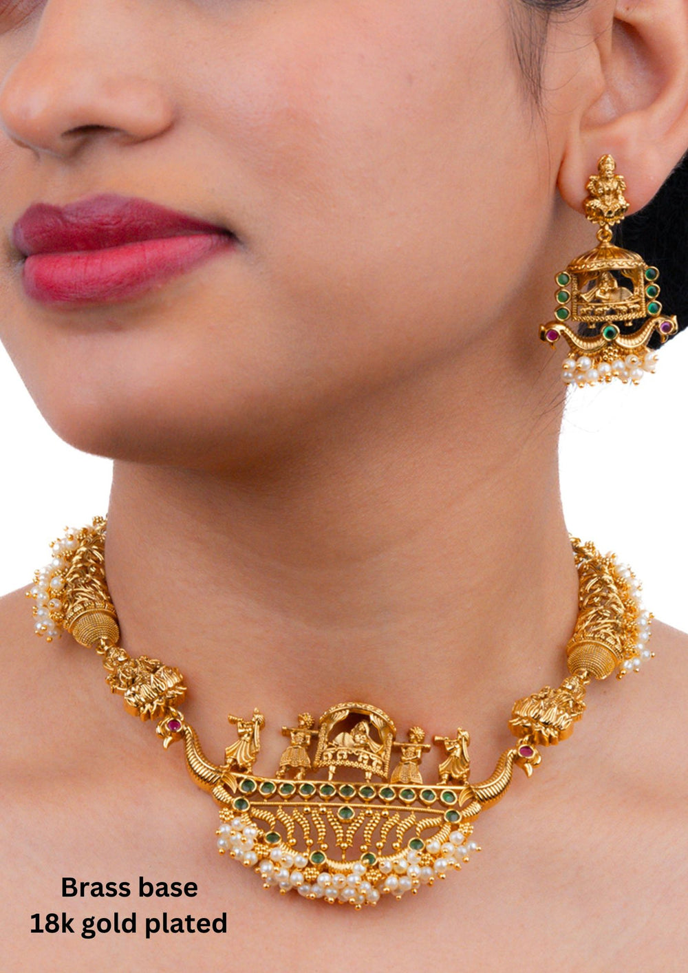 south indian women wearing gold plated kalyanam antique Temple jewelry designed with emerald gold here it is shown that a pallaki is carriying with women and two sides there are guttapusalu perfect for birdal waer