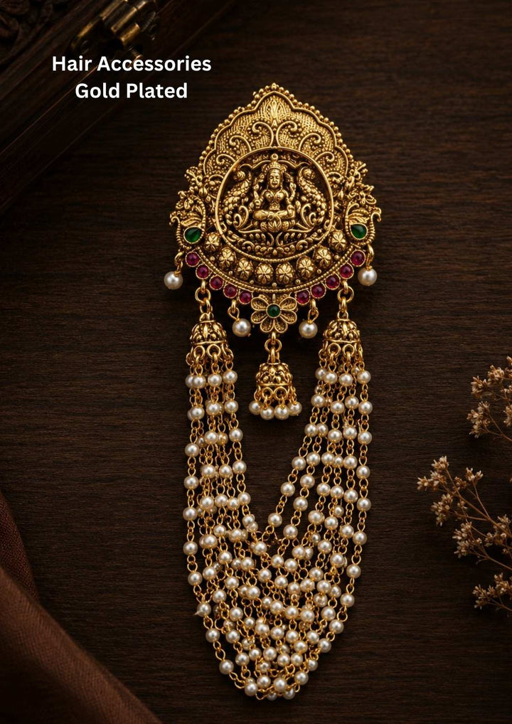 this is designed with laxmi in the center of jada billa with hangings on the side and at the bottom there is guttapusallu which is u shape pattern perfect for weddings, festivals, bridals.