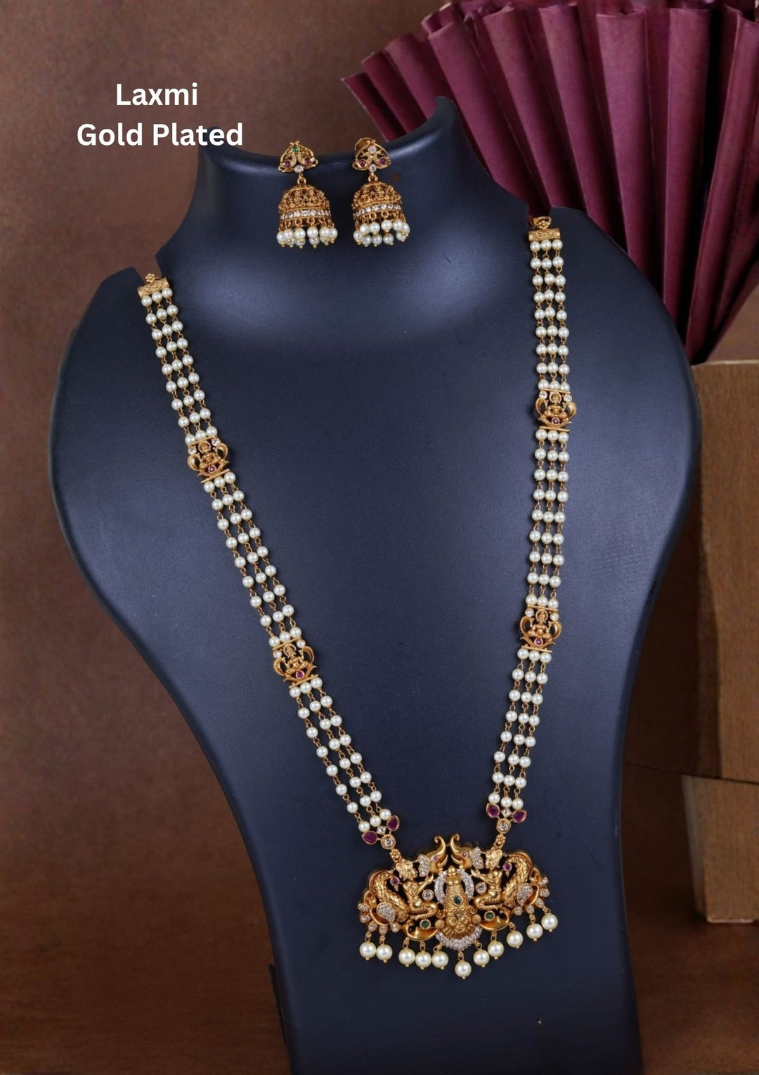 Jadau Kundan Gold Plated Temple Lakshmi Devi Beaded Necklace with Earrings design with pearl drop hangings with three row chain with whitw pearl drops . perfect for weddings