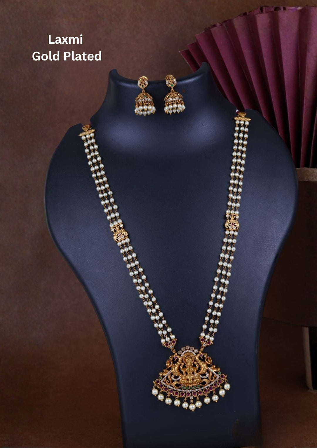 Jadau Kundan Gold Plated Temple Lakshmi Devi Beaded Necklace with Earrings design with pearl drop hangings with three row chain with whitw pearl drops . perfect for weddings