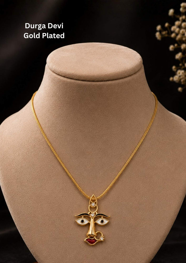 Beautiful divine face gold plated pendant chain featuring artistic enamel detailing and a sleek gold finish. Perfect for daily wear, festive occasions, temple visits, traditional outfits, and premium gifting.