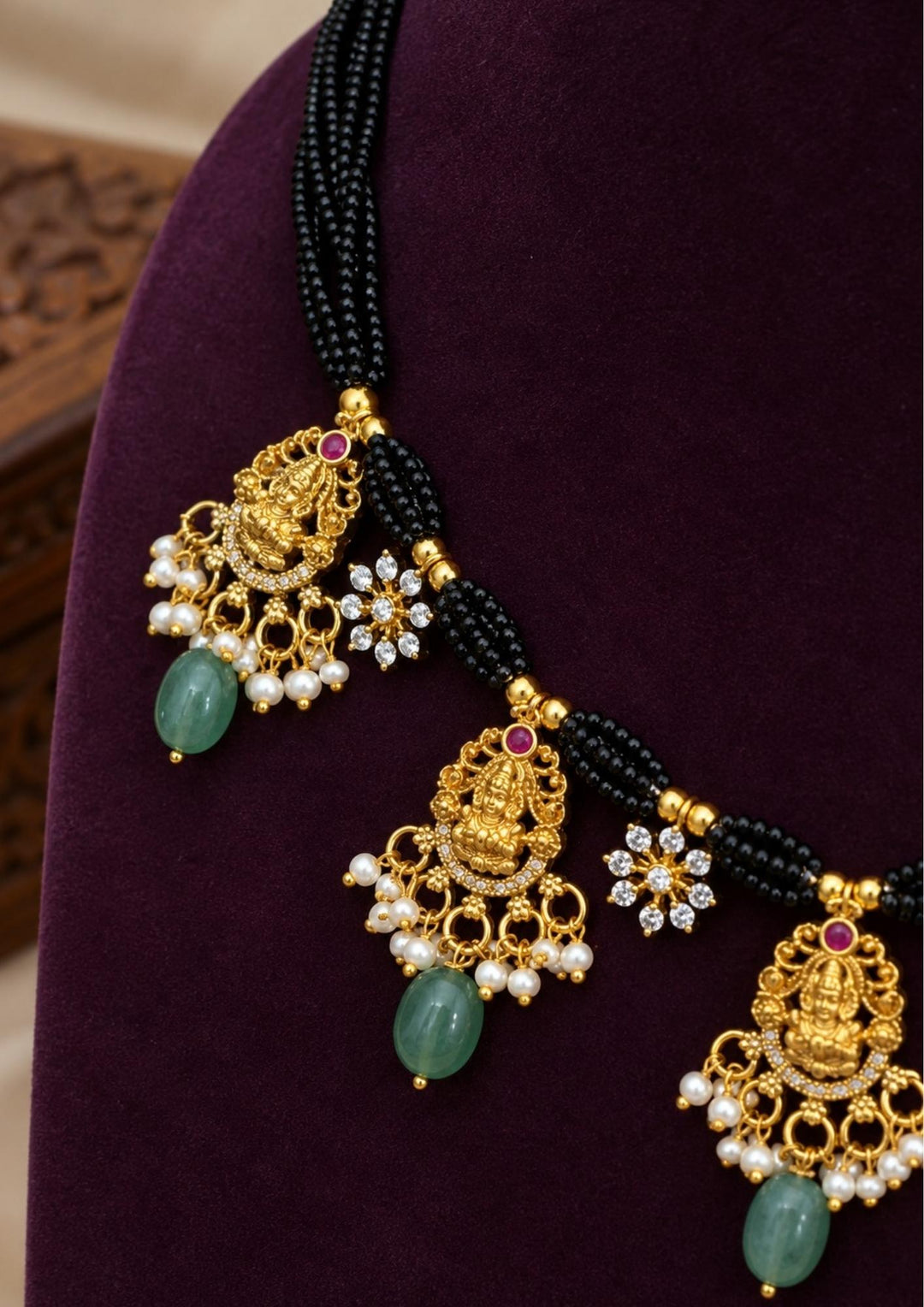 Gold Plated Black Bead Lakshmi Necklace