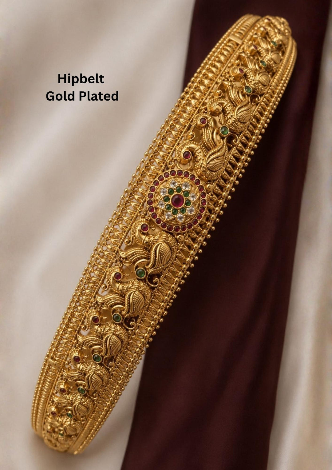 Jadau Kundan Gold Plate Peacock Design vaddanam (Hipbelts) at Zevana. Lightweight, Anti-Tarnish, Perfect for weddings & festivals and bridalwear.