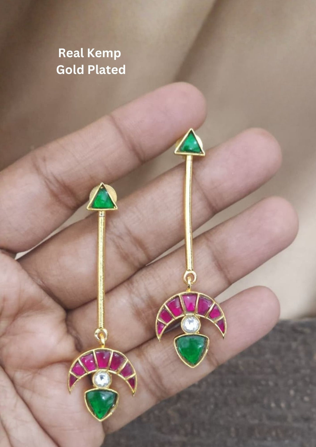 Gold plated long real kemp earrings designed in half moon shape with long bar and up stud designed in triangle shape come with lightweight perfect for weddings, functions, giftings, office wear and it is anti tarnish and skin friendly