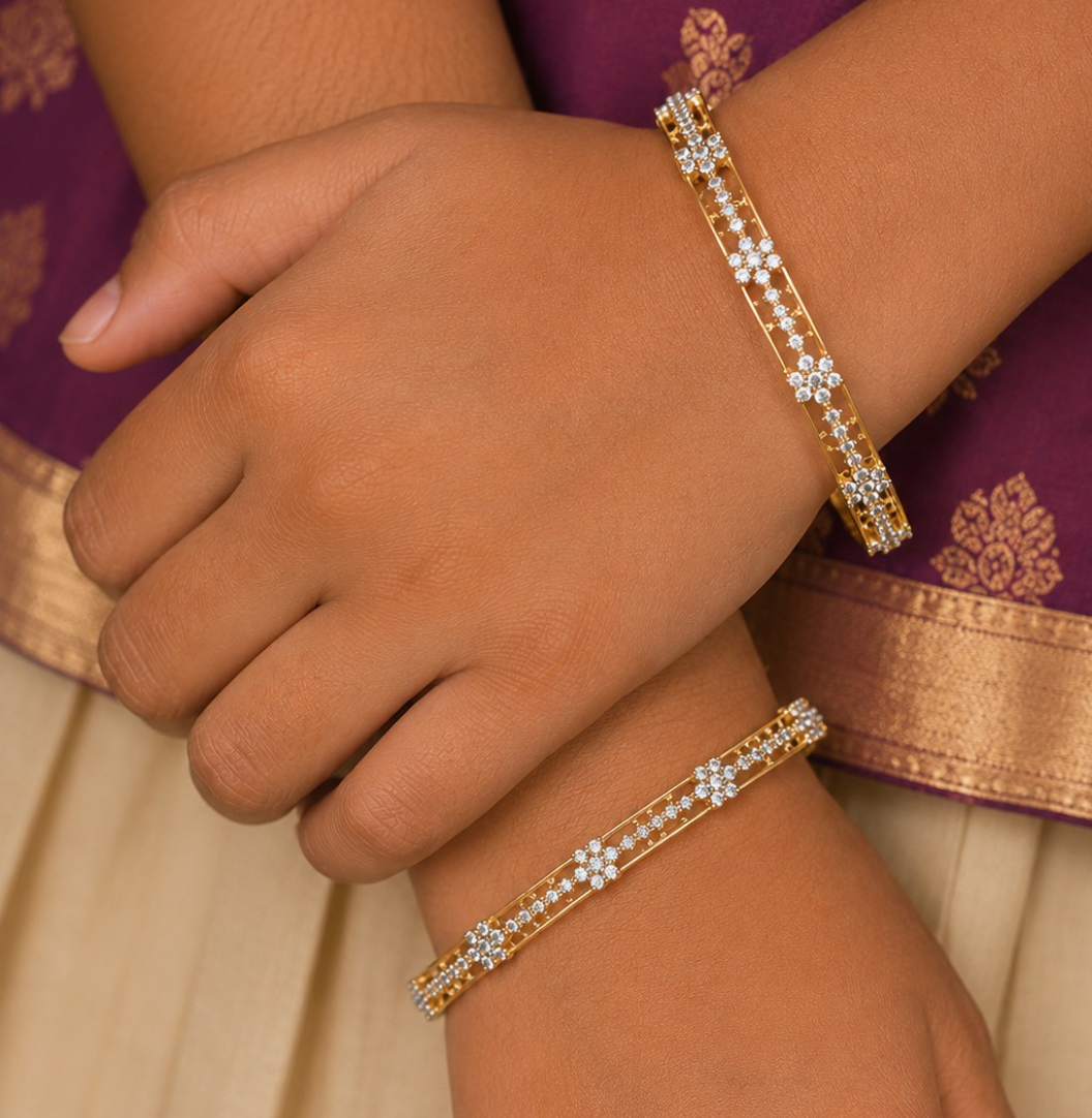 Elegant 18K gold plated zircon diamond bangles crafted with brilliant floral crystal detailing for festive and party wear.