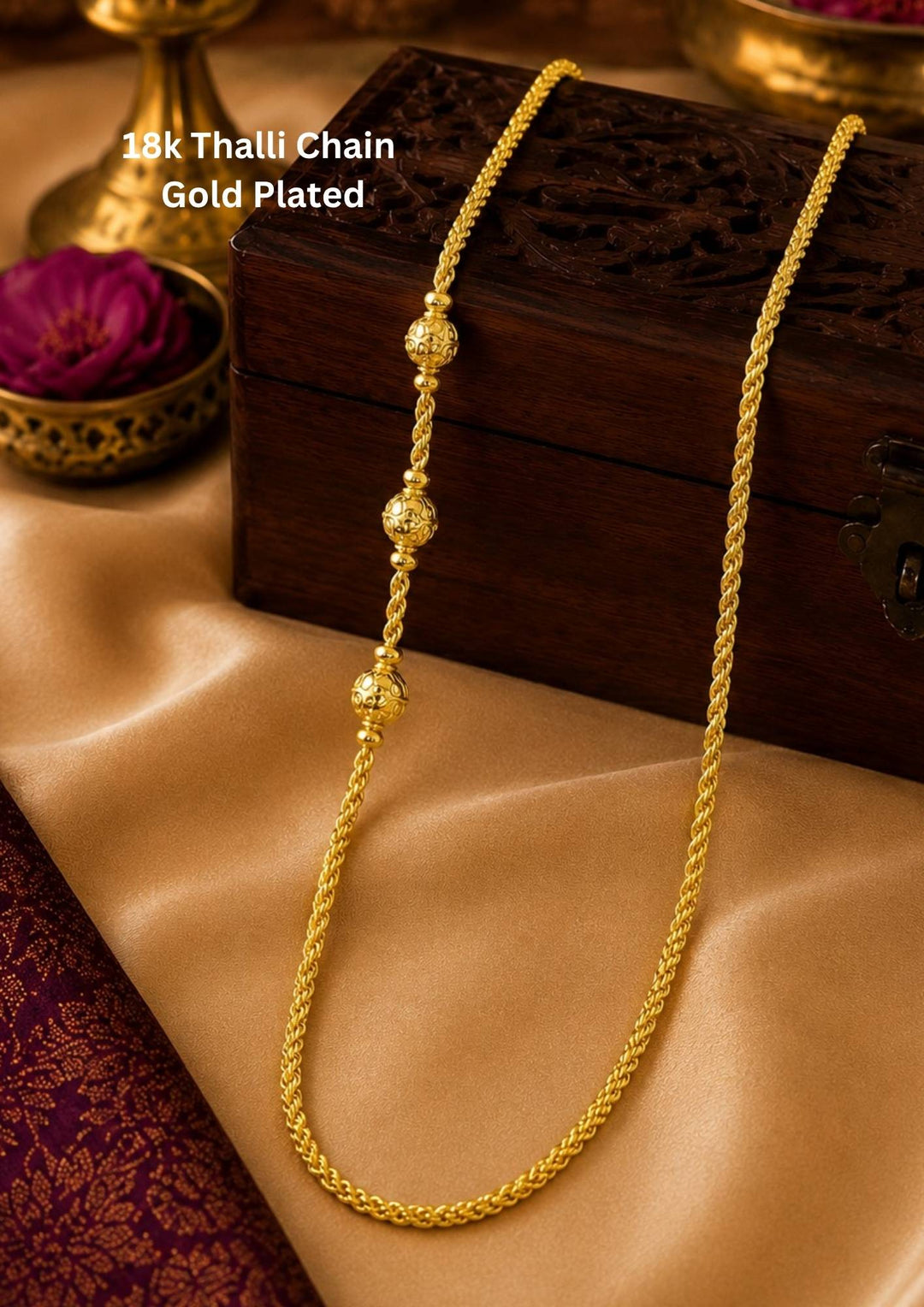 An elegant, sleek 18k gold-plated thalli chain  features a continuous, sophisticated pattern of repeating cylindrical bar links seamlessly interconnected with small circular loops, offering a clean and polished modern look. Perfect for daily wear or for pairing with your favorite pendant.