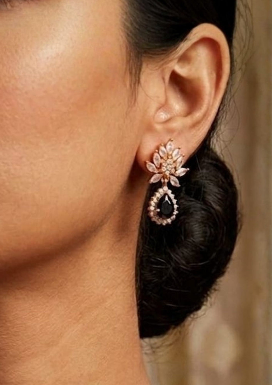 Close-up of South indian women wearing an 18K Gold Plated mangalsutra necklace set highlighting the half moon pendant design covered in white zircon diamonds. The dual-layered black bead chain pattern offers a lightweight, sweat-proof, and anti-fade quality, making it an elegant, comfortable jewelry choice for daily wear, festivals, and special events.