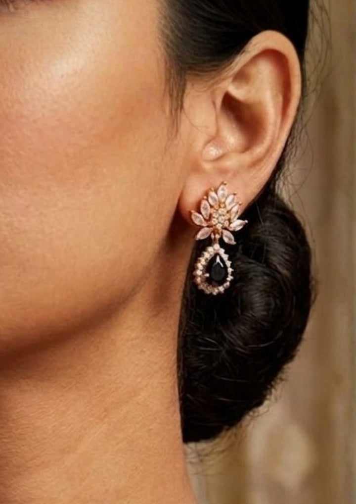 Close-up of South indian women wearing an 18K Gold Plated mangalsutra necklace set highlighting the half moon pendant design covered in white zircon diamonds. The dual-layered black bead chain pattern offers a lightweight, sweat-proof, and anti-fade quality, making it an elegant, comfortable jewelry choice for daily wear, festivals, and special events.