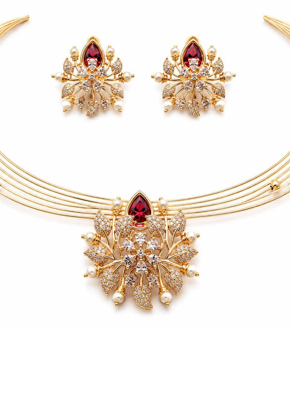 Pure zircon diamond gold plated necklace with earrings designed with white pearls and leaf shaped gold beads. with red emerald stone in middle. This necklace set has a premium gold finish, is lightweight, and comfortable to wear. Suitable for daily use, pooja, weddings, festivals, functions, and family occasions. It is sweat-proof, anti-fade, skin-friendly, and easy to wear daily