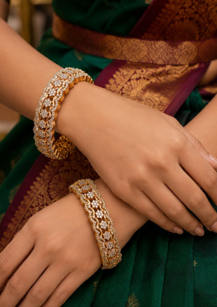 Close-up of South Indian women  hands wearing Gold plated Openable Bangles zircon diamond looks very classy and shown in picture very detailed how it look and can be use for festivals , weeding&